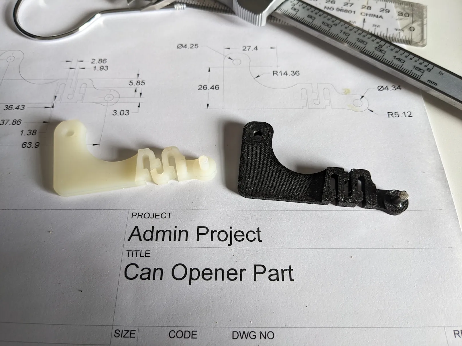Original and 3D printed can opener lever parts on a technical drawing